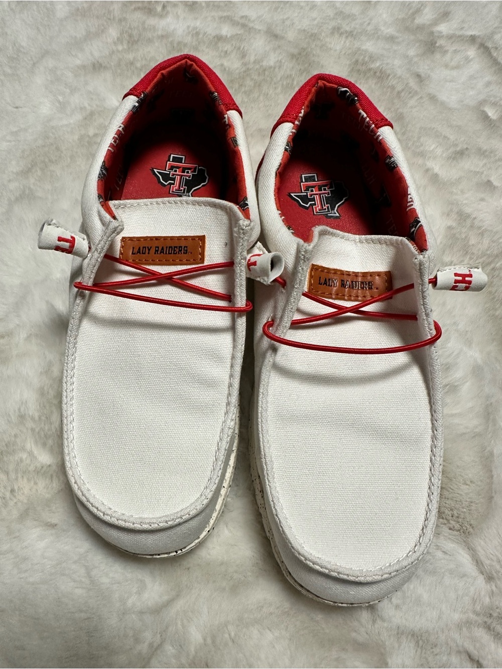 White and Red 'Lady Raiders' Canvas Slip-On Loafers